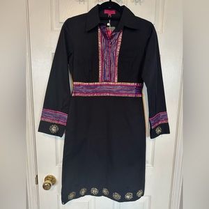 Unique black dress with red, blue, pink and gold detail.